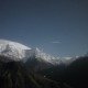 A mountain range with snow on it's top.